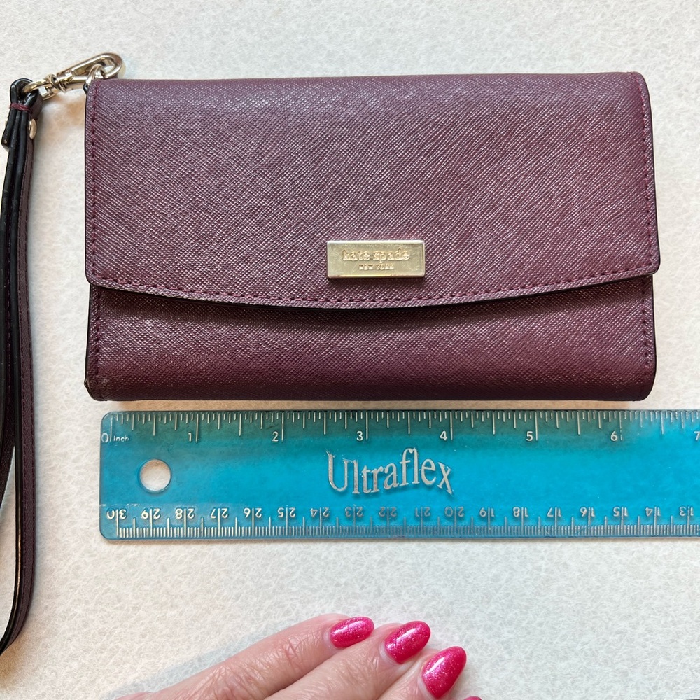 Kate Spade Maroon phone Wallet.